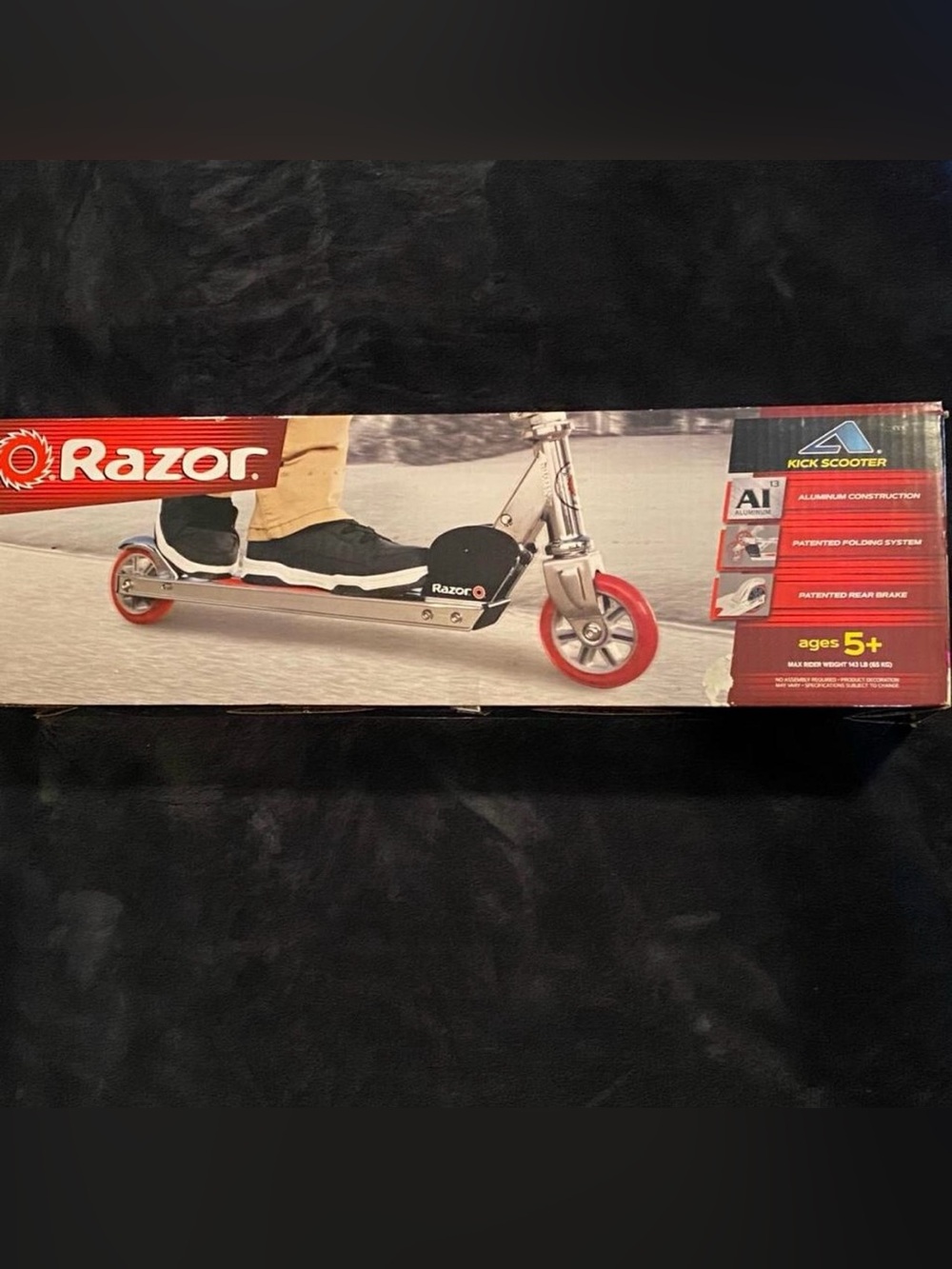 Razor Aluminum Kick Scooter in Silver with Red Wheels